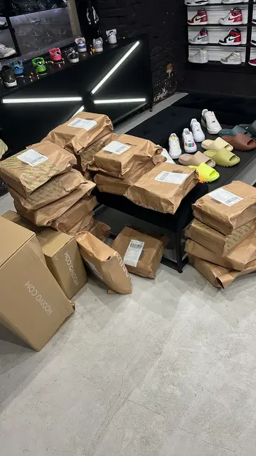 Parcels covering the floor of a sneaker shop